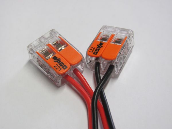 Svorka 221-412,2 vodiče,páčka,max.4mm2-32A,transp.